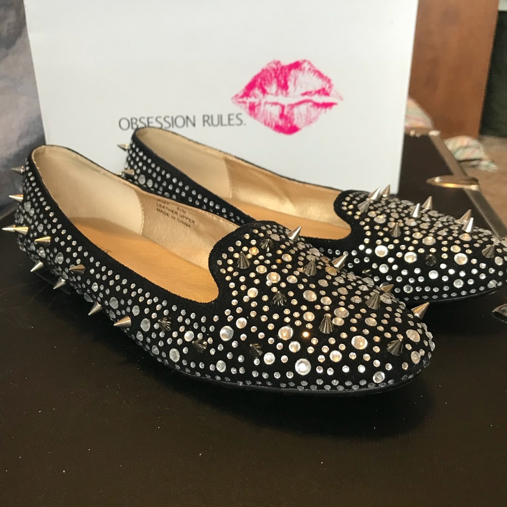 Black flats with spikes and jewels